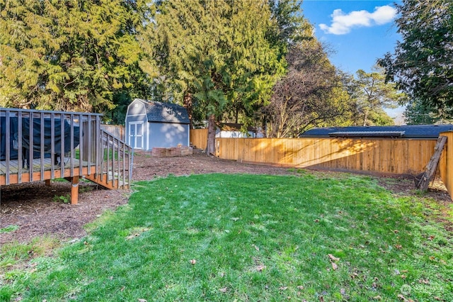 view of yard with a storage unit