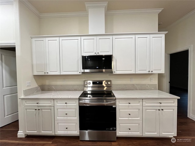 kitchen featuring white cabinetry, stainless steel appliances, dark hardwood / wood-style floors, light stone countertops, and ornamental molding