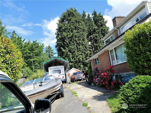 exterior space with a carport