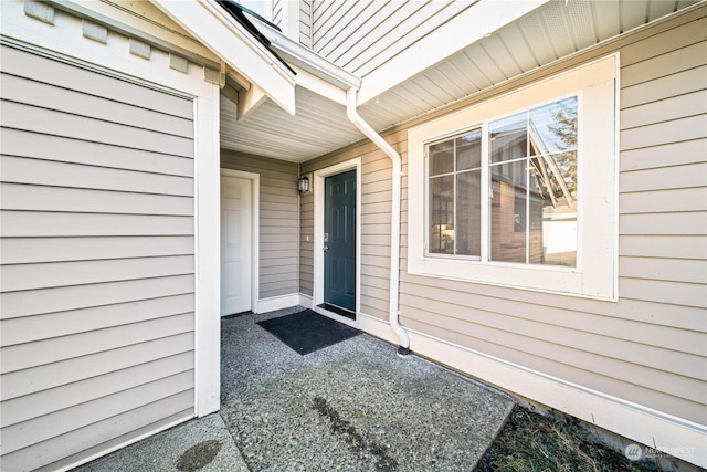 doorway to property featuring a patio area