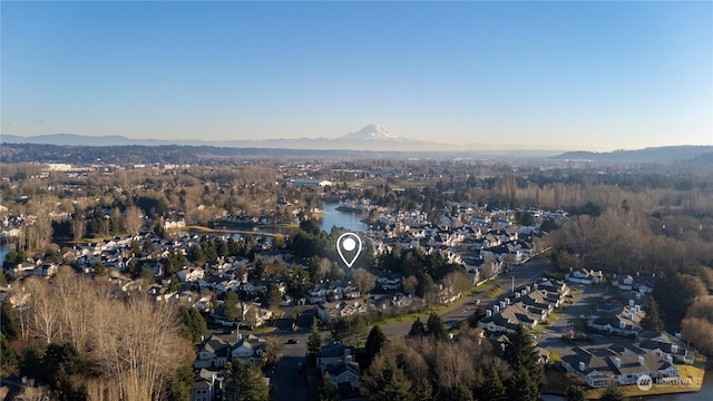 bird's eye view featuring a water and mountain view