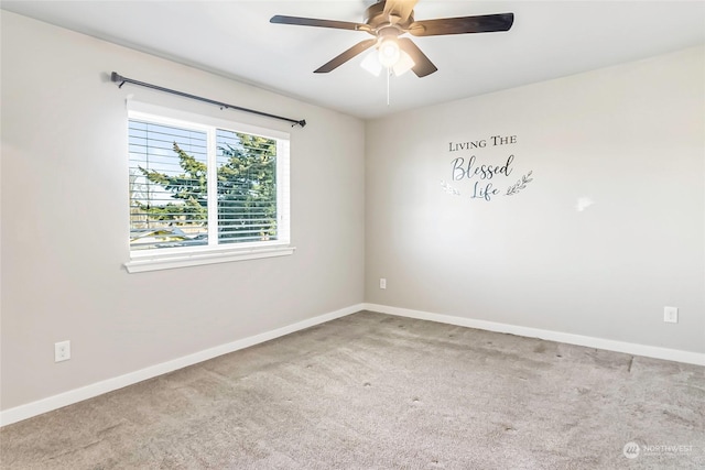 carpeted empty room with ceiling fan