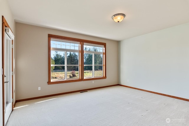 view of carpeted spare room