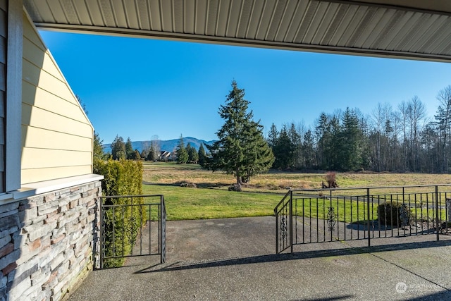 exterior space featuring a rural view and a mountain view