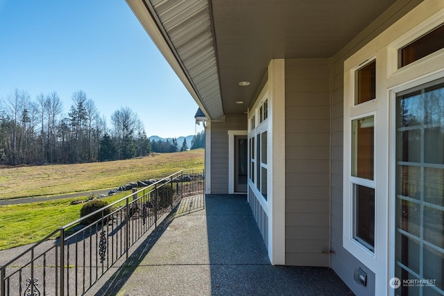 balcony featuring a rural view