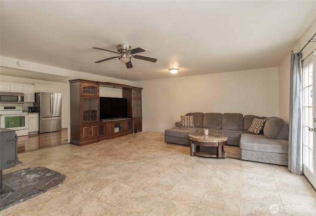 living room featuring ceiling fan