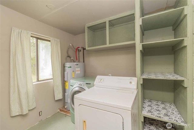 washroom featuring water heater and washer and dryer