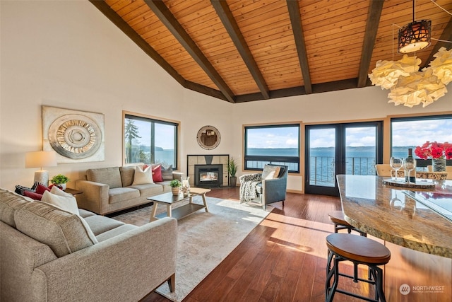 living room with wood ceiling, dark wood-type flooring, high vaulted ceiling, a water view, and beamed ceiling