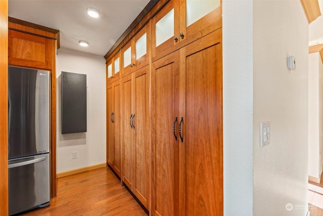 hallway featuring light wood-type flooring