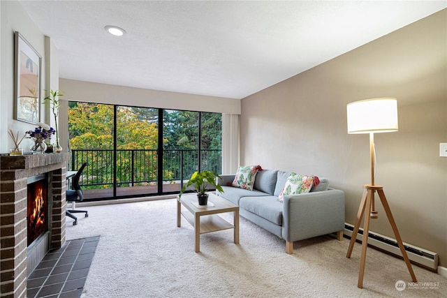 living room with a baseboard heating unit, a fireplace, and dark colored carpet