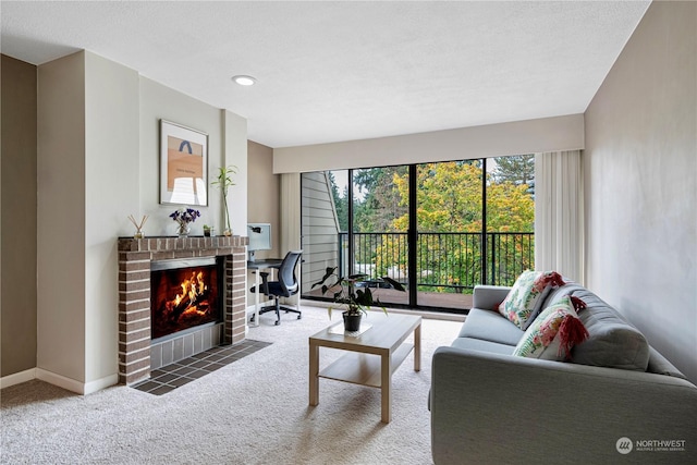 living room featuring carpet and a fireplace