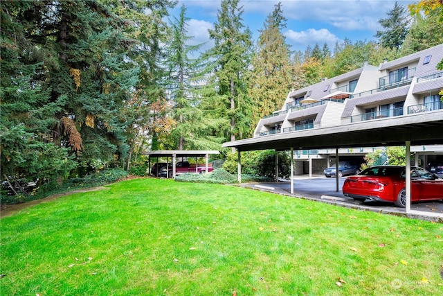 view of yard with a carport