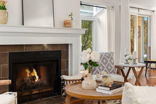 sitting room featuring hardwood / wood-style flooring and a fireplace