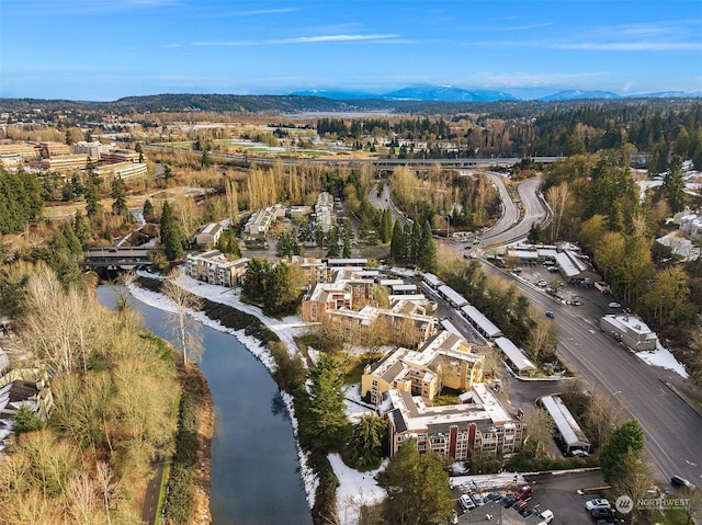 bird's eye view featuring a water and mountain view