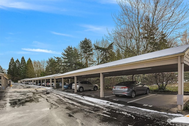 view of vehicle parking with a carport