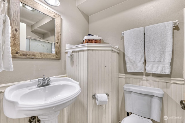 bathroom with sink and toilet