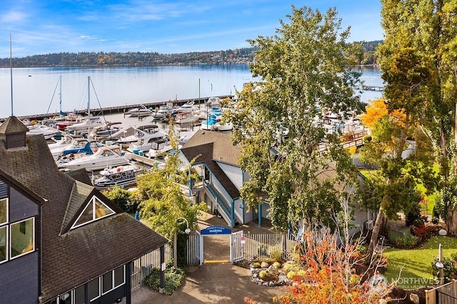 birds eye view of property featuring a water view