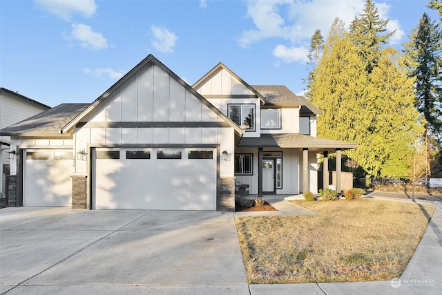 view of front of home with covered porch and a front lawn