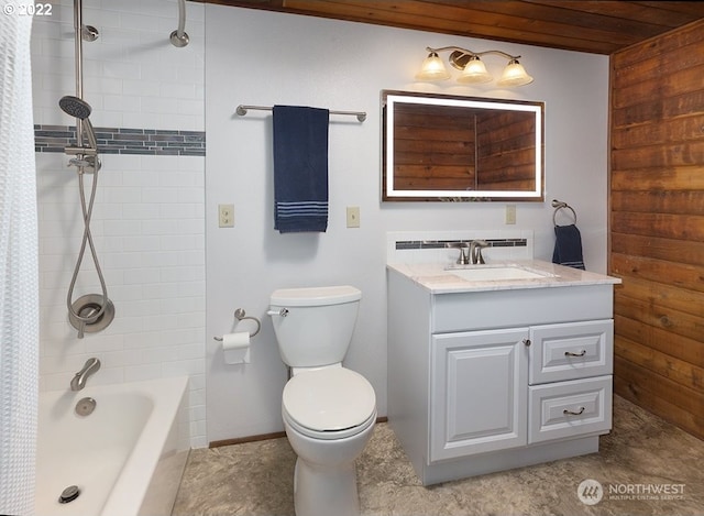 full bathroom with vanity, shower / tub combo, and toilet