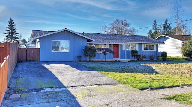 ranch-style house with a front yard