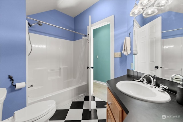 full bathroom featuring shower / bath combination, vanity, and toilet