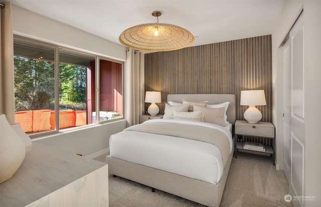 carpeted bedroom featuring a closet