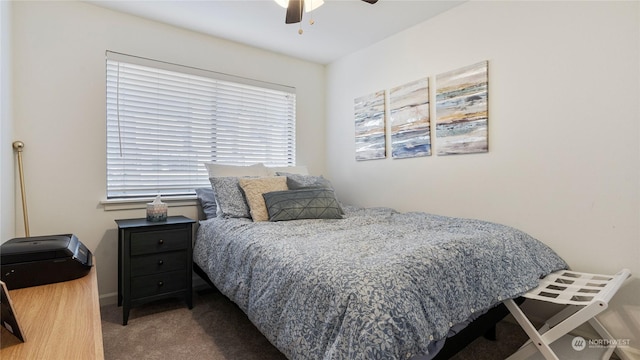 bedroom with ceiling fan and carpet floors