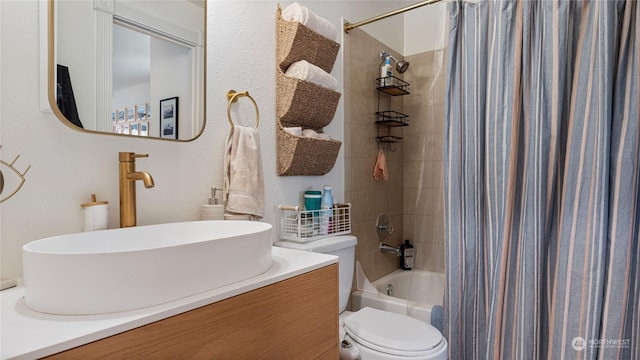 full bathroom featuring vanity, toilet, and shower / bath combo