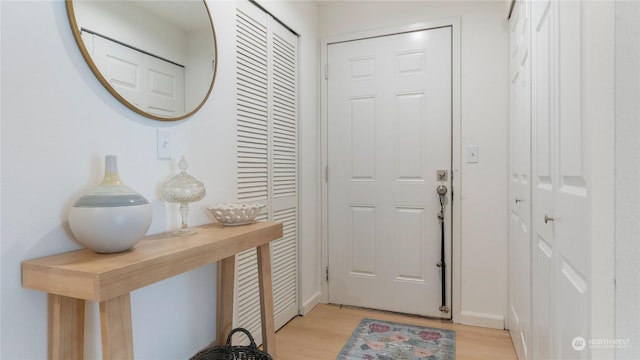 doorway featuring light hardwood / wood-style floors