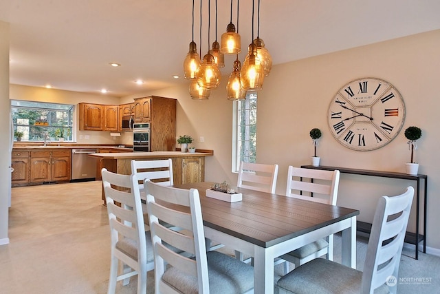 dining area featuring sink