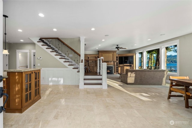 living room with ceiling fan