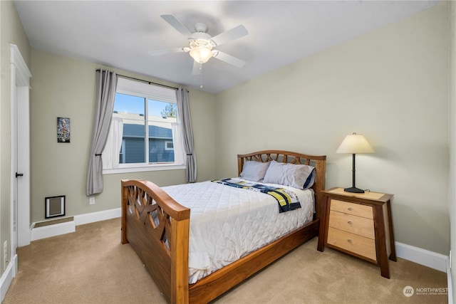 bedroom with light carpet and ceiling fan