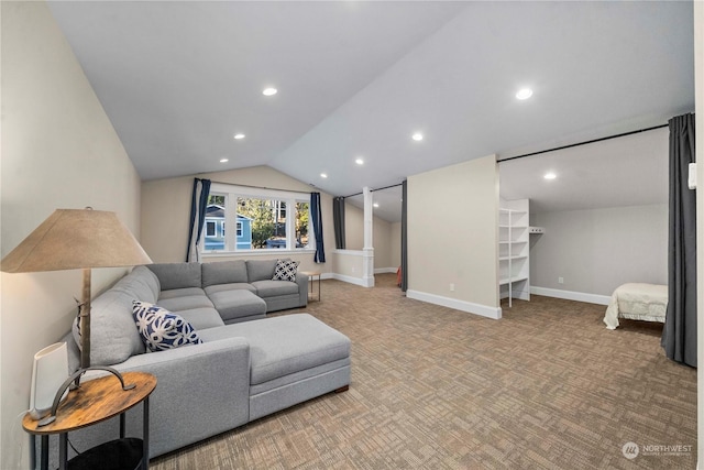 carpeted living room with vaulted ceiling