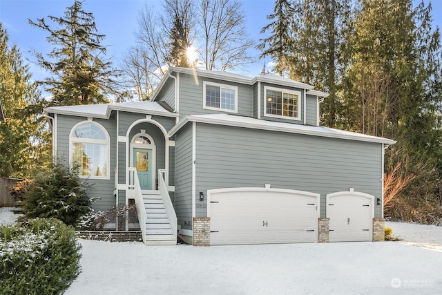 view of front of property featuring a garage