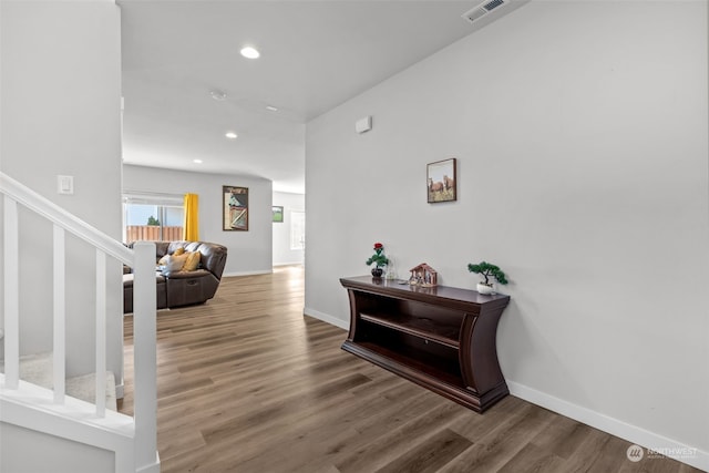 hallway featuring hardwood / wood-style floors