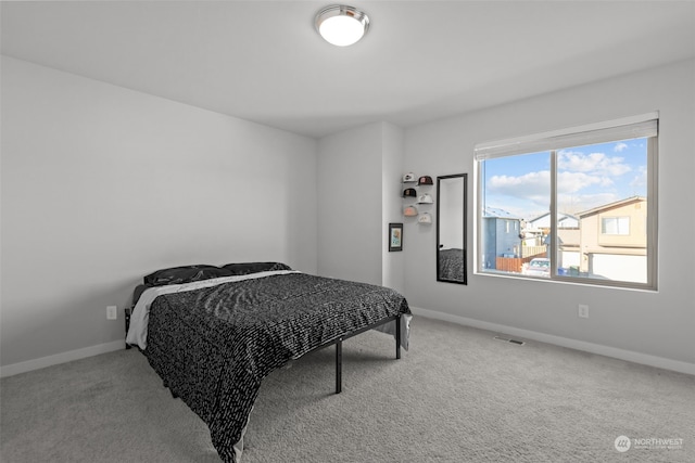 bedroom featuring carpet floors