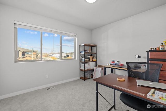 view of carpeted office space