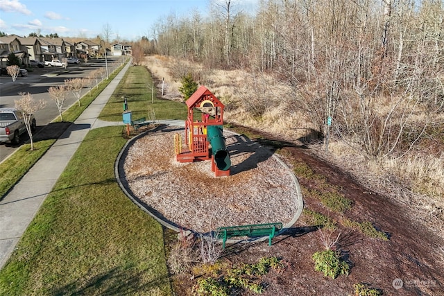 view of playground with a yard