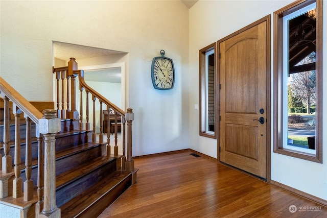 entrance foyer with hardwood / wood-style flooring