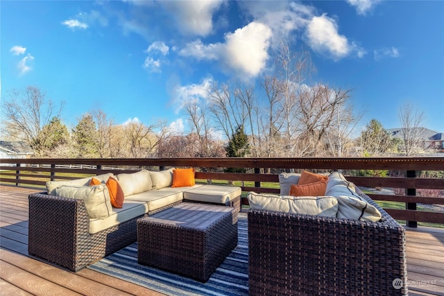 wooden terrace featuring an outdoor hangout area