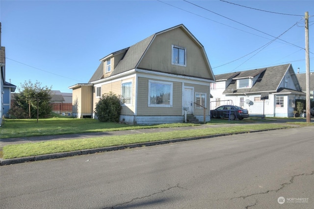 view of front of home featuring a front lawn