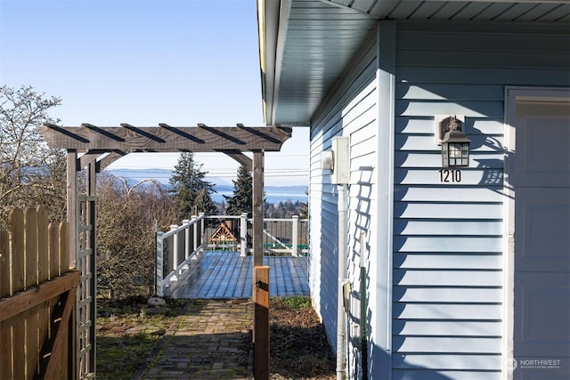 wooden deck featuring a pergola