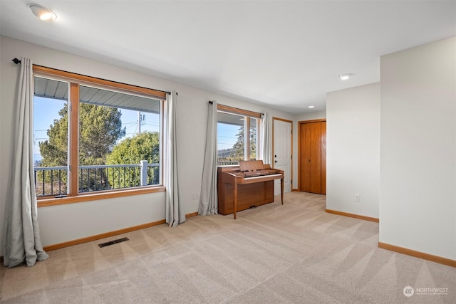 view of carpeted spare room