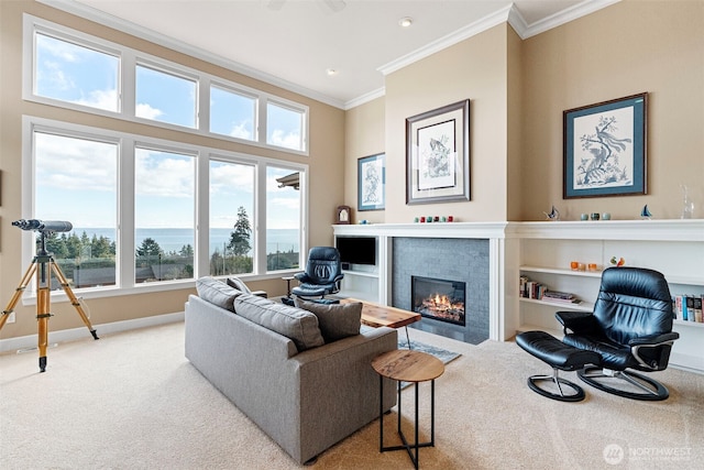 living room featuring light carpet, ornamental molding, a fireplace with flush hearth, and baseboards