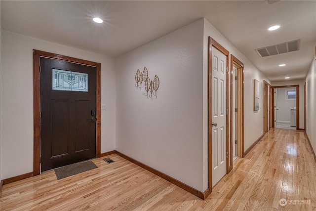 entrance foyer featuring light hardwood / wood-style floors