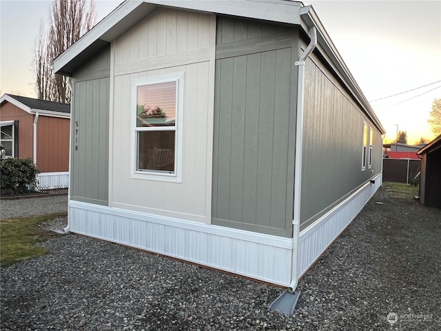 view of property exterior at dusk