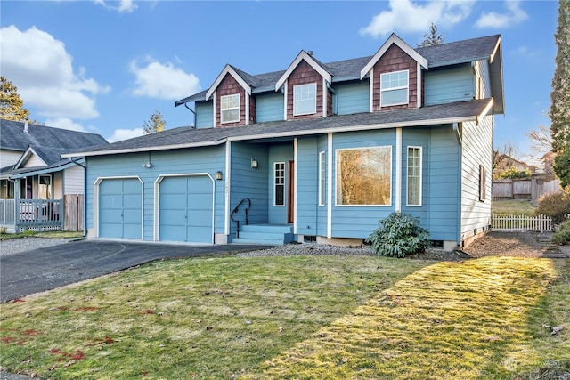 view of front facade featuring a garage and a front lawn