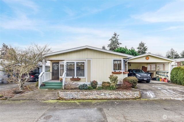 view of front of home featuring a carport