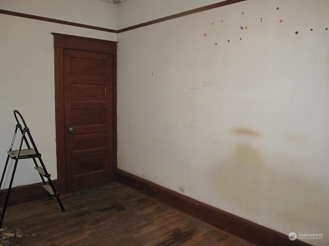 empty room featuring dark hardwood / wood-style floors