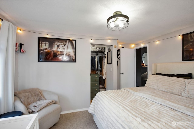 bedroom featuring carpet and a closet